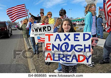Ordinary citizen protestors protest taxes and other government wasteful spending View Large Photo Image Stock Photography - Ordinary citizen protestors protest taxes and other government wasteful spending. Fotosearch