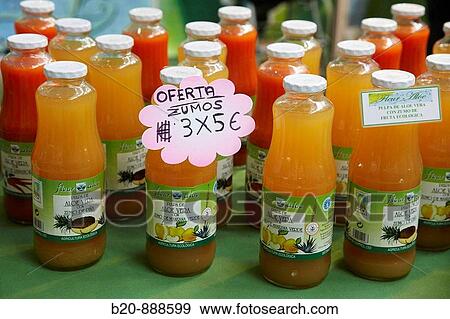 Stock Photo - Organic fruit juices stand, Bioterra (Organic products, bioconstruction, renewables energies, and efficient consumption fair), Ficoba, Irun, Guipuzcoa, Basque Country, Spain. Fotosearch