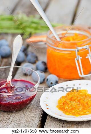 Stock Photo - Organic marmalade from bullace plums and carrot marmalade. Fotosearch