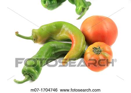Stock Photograph - Organic peppers and tomatoes. Spanish orchard. Fotosearch
