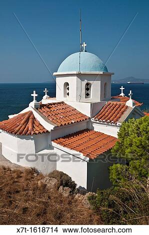 Orthodox church overlooking Neapoli Bay and the island of Elafonissos At Paleokastro near Neapoli, Southern Lakonia, Peloponnese, Greece View Large Photo Image Picture - Orthodox church overlooking Neapoli Bay and the island of Elafonissos At Paleokastro near Neapoli, Southern Lakonia, Peloponnese, Greece. Fotosearch