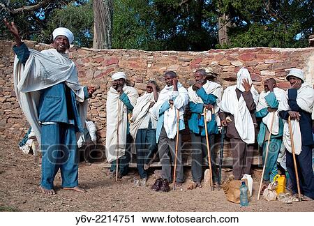 Stock Image - Orthodox priest saying the mass. Medhane Alem Kesho church in Tigray state, Ethiopia.. Fotosearch