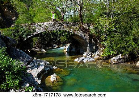 Otsindundua old bridge Roncal valley, Navarre, Spain View Large Photo Image Stock Photo - Otsindundua old bridge Roncal valley, Navarre, Spain. Fotosearch