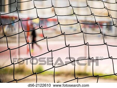 out of focus young man in a fooball field. View Large Photo Image Stock Image - out of focus young man in a fooball field.. Fotosearch