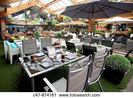 Outdoor furniture for sale in a garden center View Large Photo Image Stock Image - Outdoor furniture for sale in a garden center. Fotosearch
