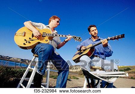 Outdoor guitar lesson View Large Photo Image Picture - Outdoor guitar lesson. Fotosearch