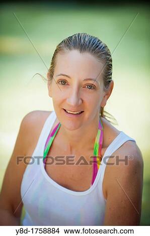 Outdoor portrait of 45 years old caucasian woman View Large Photo Image Picture - Outdoor portrait of 45 years old caucasian woman. Fotosearch