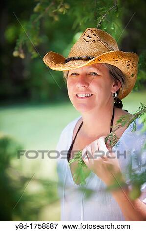 Outdoor portrait of 45 years old caucasian woman View Large Photo Image Stock Photo - Outdoor portrait of 45 years old caucasian woman. Fotosearch