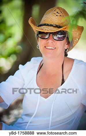 Stock Photo - Outdoor portrait of 45 years old caucasian woman. Fotosearch