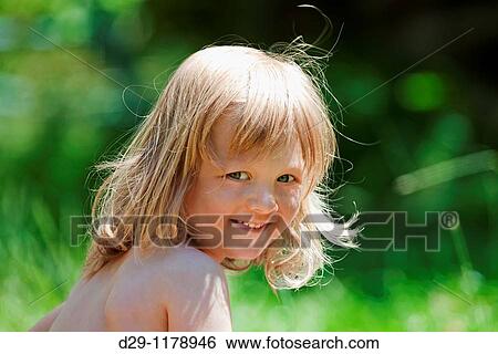outdoor portrait of a beatiful boy with long blond hair View Large Photo Image Stock Photograph - outdoor portrait of a beatiful boy with long blond hair. Fotosearch