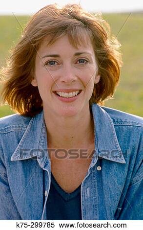 Outdoor portrait of a woman View Large Photo Image Stock Photography - Outdoor portrait of a woman. Fotosearch