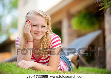 Outdoor portrait of blond teenage girl View Large Photo Image Stock Photo - Outdoor portrait of blond teenage girl. Fotosearch