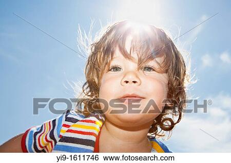 Stock Photograph - outdoor portrait of child. Fotosearch