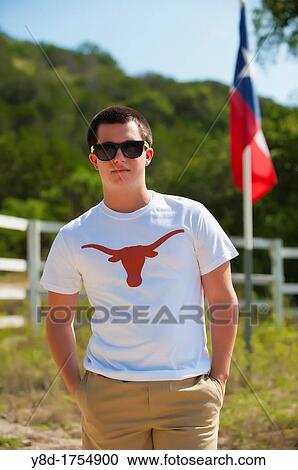 Outdoor portrait of young american male teenager of 17 years with Texas flag in the background View Large Photo Image Stock Image - Outdoor portrait of young american male teenager of 17 years with Texas flag in the background. Fotosearch