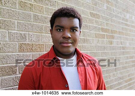Outdoor portrait of young gay African-American man View Large Photo Image Stock Photography - Outdoor portrait of young gay African-American man. Fotosearch