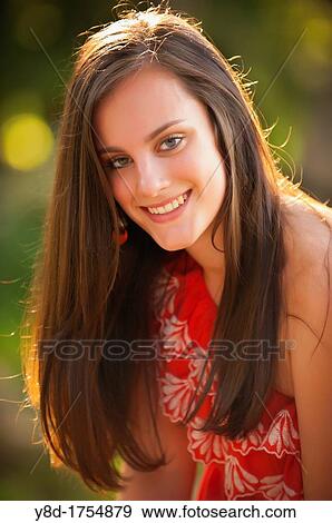 Outdoor portrait of young woman with brunette hair, 17 years old caucasian View Large Photo Image Stock Photo - Outdoor portrait of young woman with brunette hair, 17 years old caucasian. Fotosearch
