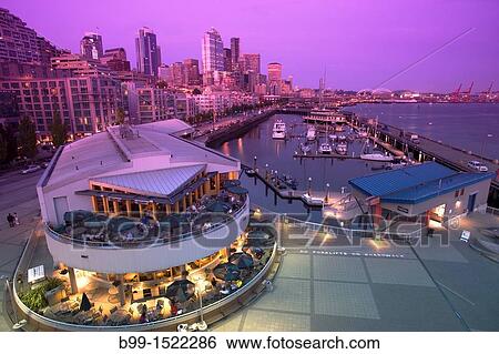 OUTDOOR RESTAURANT PIER 66 BELL STREET MARINA ELLIOT BAY DOWNTOWN SKYLINE SEATTLE WASHINGTON STATE USA View Large Photo Image Stock Photograph - OUTDOOR RESTAURANT PIER 66 BELL STREET MARINA ELLIOT BAY DOWNTOWN SKYLINE SEATTLE WASHINGTON STATE USA. Fotosearch