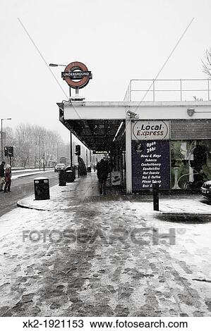 Outside Bermondsey tube station snowing, Jubilee Line, London, UK View Large Photo Image Stock Image - Outside Bermondsey tube station snowing, Jubilee Line, London, UK. Fotosearch