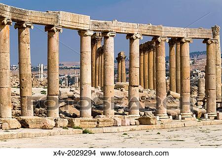 Oval Plaza with colonnade and ionic columns, Jerash, Gerasa Roman Decapolis City, Jordan, Middle East. View Large Photo Image Picture - Oval Plaza with colonnade and ionic columns, Jerash, Gerasa Roman Decapolis City, Jordan, Middle East.. Fotosearch