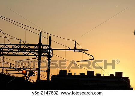 overhead train power lines at sunset in rome italy View Large Photo Image Stock Image - overhead train power lines at sunset in rome italy. Fotosearch