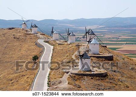 Overview mills Consuegra from one of the towers of the Castle Consuegra, Toledo, Castilla La Mancha, Spain View Large Photo Image Picture - Overview mills Consuegra from one of the towers of the Castle Consuegra, Toledo, Castilla La Mancha, Spain. Fotosearch