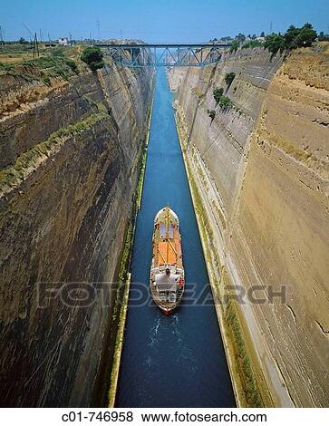 Stock Photo - Overview of a cargo crossing the Corinth canal, Peloponnese, Greece. Fotosearch