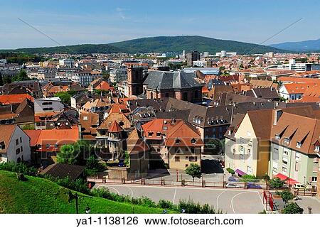 Overview of old town and Saint Christoph cathedral, viewed from citadel Belfort city, Belfort territory, Franche Comte region, Europe View Large Photo Image Stock Photograph - Overview of old town and Saint Christoph cathedral, viewed from citadel Belfort city, Belfort territory, Franche Comte region, Europe. Fotosearch
