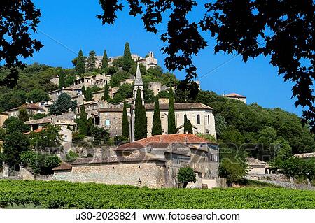 Overview of Roque-sur-Ceze, labelled The Most Beautiful Villages of France, in Gard deparment, Languedoc-Roussillon region. France. View Large Photo Image Picture - Overview of Roque-sur-Ceze, labelled The Most Beautiful Villages of France, in Gard deparment, Languedoc-Roussillon region. France.. Fotosearch