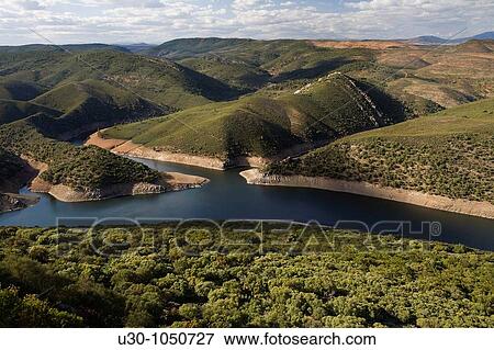 Stock Photo - Overview of Tajo river, from Monfrague Castle, in Monfrague National Park Biosphere Reserve CBceres province Extremadura spain. Fotosearch