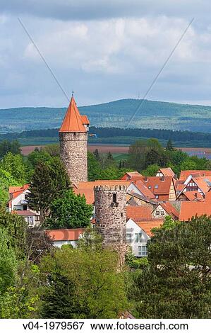 Stock Photo - Overview of the picturesque village of Grebenstein with one of the historic tower of the town wall, Hesse, Germany, Europe. Fotosearch