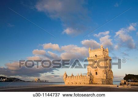 Overview of Tower of Belem at dawn, in Lisboa city, next to the mounth of Tagus river in Atlantic Ocean Portugal View Large Photo Image Stock Photo - Overview of Tower of Belem at dawn, in Lisboa city, next to the mounth of Tagus river in Atlantic Ocean Portugal. Fotosearch