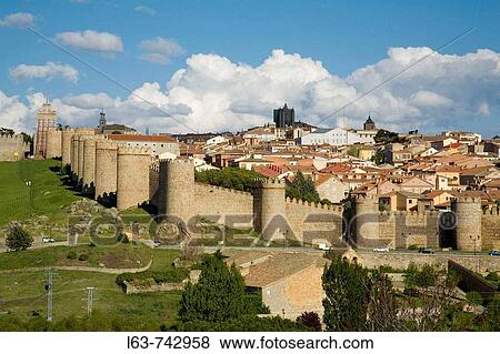 Overview of? vila with the medieval city walls, the best preserved ones in Spain. They date from 1090, with 2, 5 km long, 88 towers and 6 gates.? vila (city added to the Unesco's World Heritage List in 1985). Castilla-Le? n. Spain View Large Photo Image Stock Photo - Overview of? vila with the medieval city walls, the best preserved ones in Spain. They date from 1090, with 2, 5 km long, 88 towers and 6 gates.? vila (city added to the Unesco's World Heritage List in 1985). Castilla-Le? n. Spain. Fotosearch