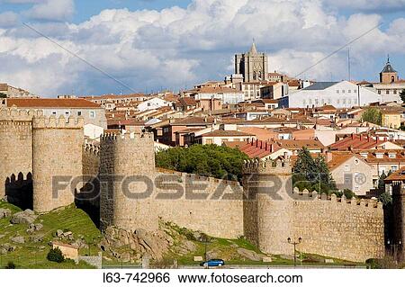 Stock Photograph - Overview of? vila with the medieval city walls, the best preserved ones in Spain. They date from 1090, with 2, 5 km long, 88 towers and 6 gates.? vila (city added to the Unesco's World Heritage List in 1985). Castilla-Le? n. Spain. Fotosearch