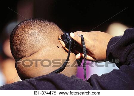 Stock Photography - Overweight black man on the phone.. Fotosearch