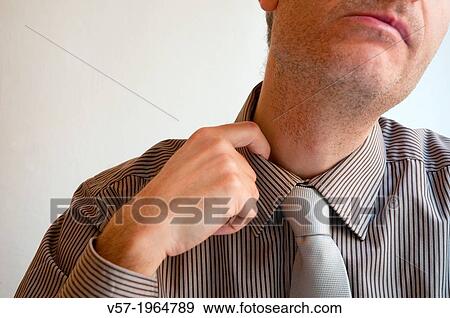 Stock Photo - Overwhelmed executive. Close view.. Fotosearch