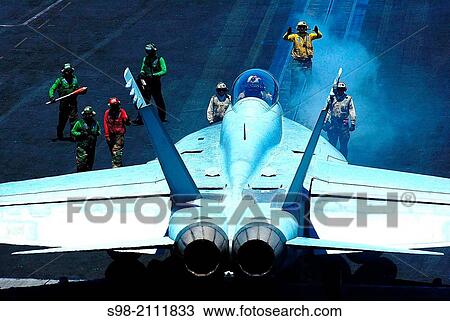 PACIFIC OCEAN (April 16, 2008) Sailors aboard the nuclear-powered aircraft carrier USS Nimitz (CVN 68) prepare an F/A-18F Super Hornet assigned to the? Black Aces? of Strike Fighter Squadron (VFA) 41 for launch. View Large Photo Image Stock Image - PACIFIC OCEAN (April 16, 2008) Sailors aboard the nuclear-powered aircraft carrier USS Nimitz (CVN 68) prepare an F/A-18F Super Hornet assigned to the? Black Aces? of Strike Fighter Squadron (VFA) 41 for launch.. Fotosearch