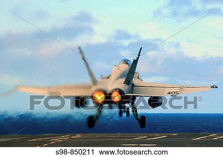 PACIFIC OCEAN (Feb. 25, 2009) An F/A-18C Hornet, assigned to the Sidewinders of Strike Fighter Squadron (VFA) 86, launches off the flight deck of the nuclear-powered aircraft carrier USS Nimitz (CVN 68). View Large Photo Image Stock Image - PACIFIC OCEAN (Feb. 25, 2009) An F/A-18C Hornet, assigned to the Sidewinders of Strike Fighter Squadron (VFA) 86, launches off the flight deck of the nuclear-powered aircraft carrier USS Nimitz (CVN 68).. Fotosearch