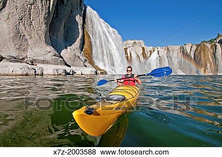 paddling a kayak below Shoshone Falls on the Snake River in the Snake River Canyon near the city of Twin Falls in southern Idaho. View Large Photo Image Stock Photo - paddling a kayak below Shoshone Falls on the Snake River in the Snake River Canyon near the city of Twin Falls in southern Idaho.. Fotosearch