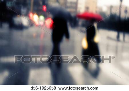 Padestrians in a rainy day, Valencia, Spain View Large Photo Image Stock Photo - Padestrians in a rainy day, Valencia, Spain. Fotosearch