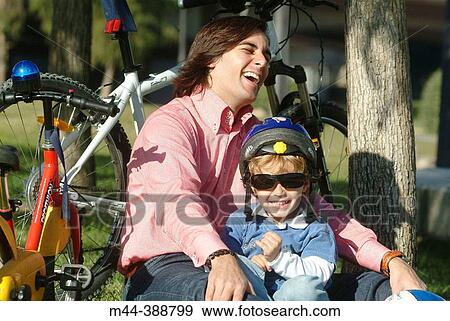 Padre jugando con su hijo en Valencia View Large Photo Image Stock Photo - Padre jugando con su hijo en Valencia. Fotosearch