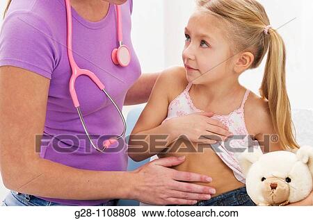 paediatric examination stomach ache with girl 7 View Large Photo Image Stock Photo - paediatric examination stomach ache with girl 7. Fotosearch