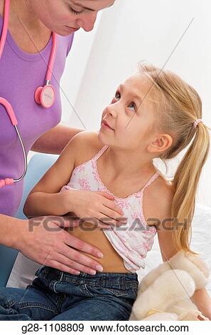 paediatric examination stomach ache with girl 7 View Large Photo Image Stock Photo - paediatric examination stomach ache with girl 7. Fotosearch