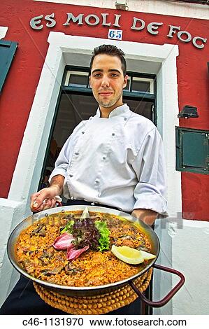 Stock Image - Paella at the Restaurant Es Moli de Foc. Sant Climent. Minorca. Balearic Islands. Spain.. Fotosearch
