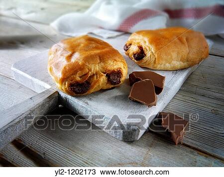 pain au chocolate - French pastry View Large Photo Image Stock Image - pain au chocolate - French pastry. Fotosearch