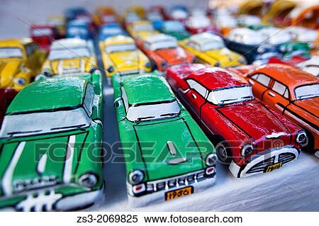 Painted papier mache model cars on the open air market, Trinidad, Sancti Sp? ritus Province, Cuba, Central America. View Large Photo Image Stock Photography - Painted papier mache model cars on the open air market, Trinidad, Sancti Sp? ritus Province, Cuba, Central America.. Fotosearch