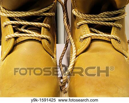 Pair of boots in shop window in Italy View Large Photo Image Stock Photography - Pair of boots in shop window in Italy. Fotosearch