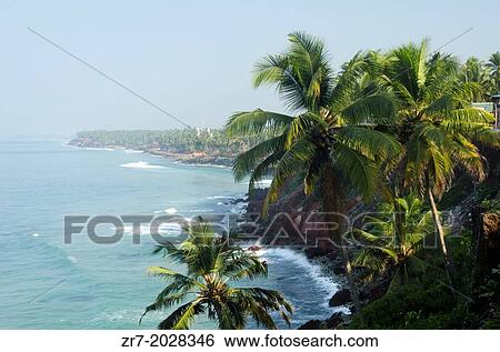 Palm-fringed beach in Varkala, Kerala, Indian Subcontinent. View Large Photo Image Stock Photograph - Palm-fringed beach in Varkala, Kerala, Indian Subcontinent.. Fotosearch