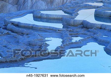 Stock Image - Pamukkale; Terrace Pools; Blue Water; UNESCO World Heritage Site; Turkey.. Fotosearch