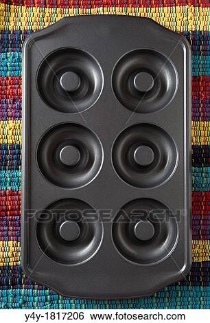 Pan for baking donuts View Large Photo Image Stock Photograph - Pan for baking donuts. Fotosearch