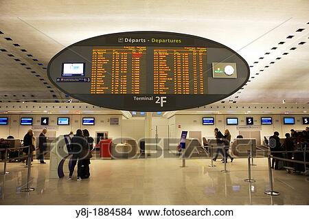 Picture - Panel with departure times inside the Roissy Charles de Gaulle airport in France. Fotosearch